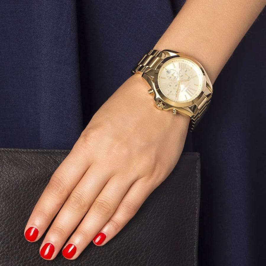 Front view of Michael Kors MK5605 women's gold-tone watch with monochromatic dial