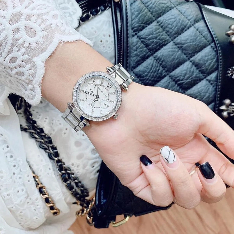 Front view of Michael Kors MK5615 women's silver-tone watch with monochrome dial