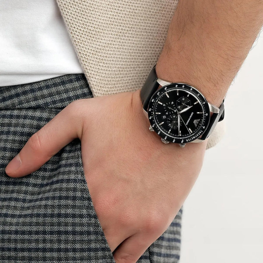 Front view of Emporio Armani AR11243 men’s watch with black dial and leather strap