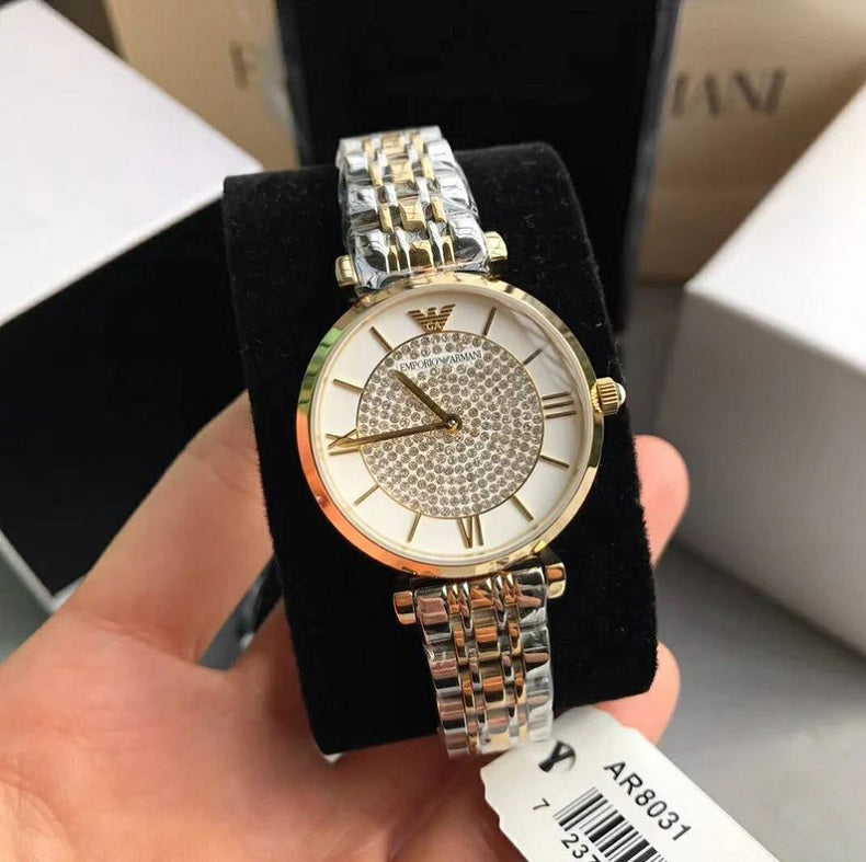 Front view of Emporio Armani AR8031 Gianni T-Bar women’s watch with white pave crystal dial and two-tone strap