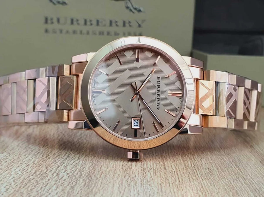Burberry BU9039  Rose Gold Stainless Steel Strap With Gold Dial Watch For Unisex