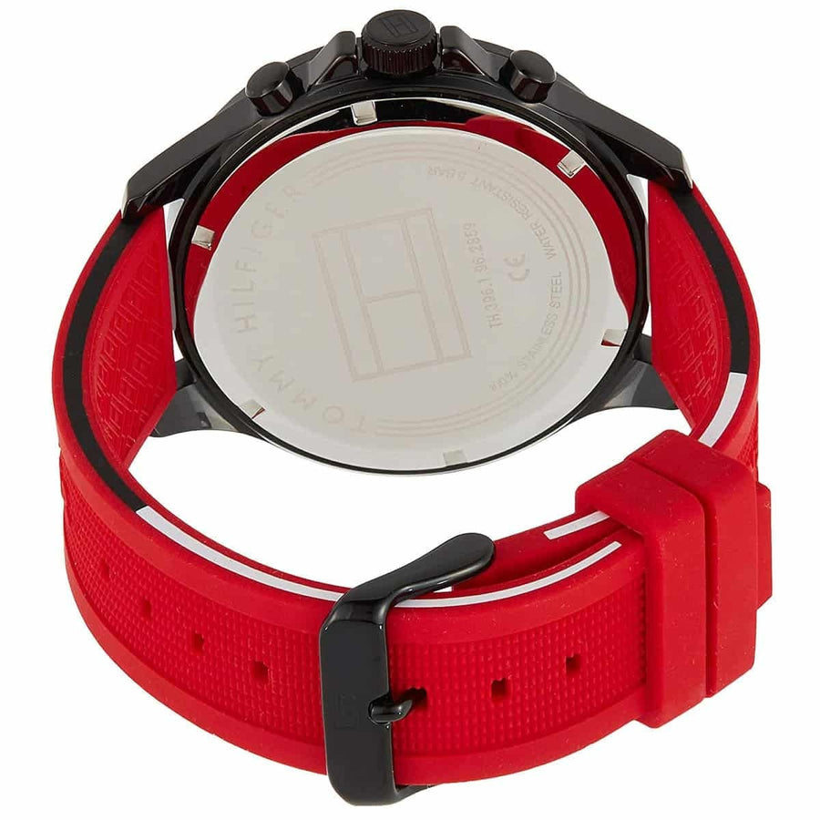 Close-up of Tommy Hilfiger 1791722 men’s watch featuring black dial, red silicone strap, and black case