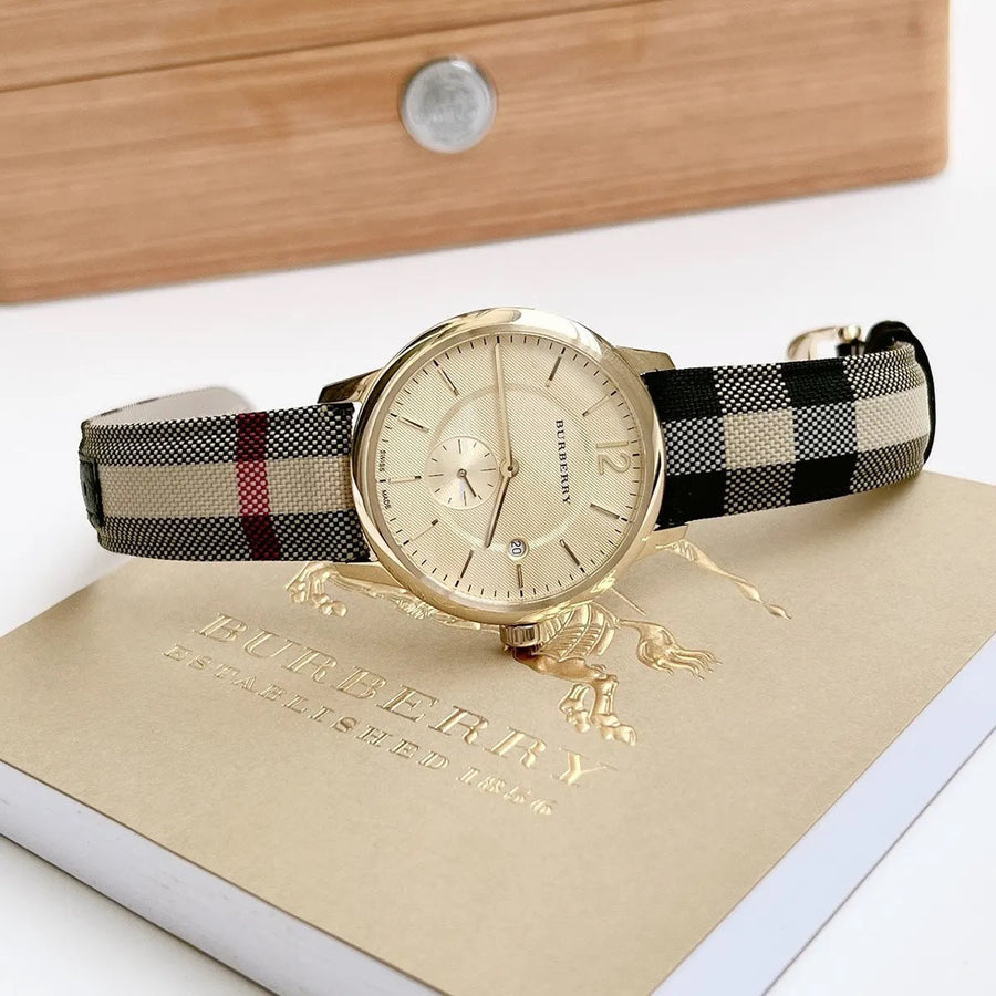 Front view of Burberry BU10001 men's watch with leather multicolour strap, gold dial, and gold case from The City collection