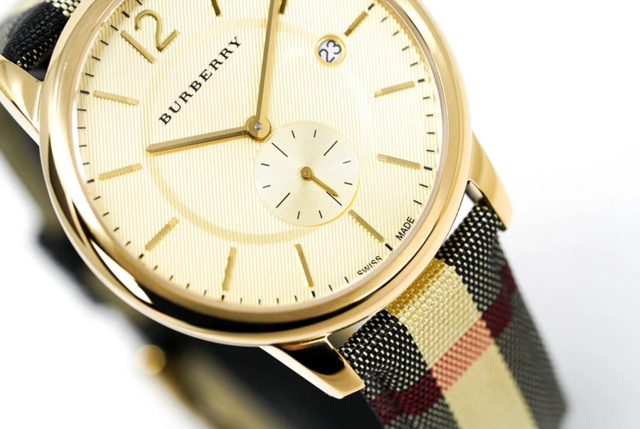 Front view of Burberry BU10001 men's watch with leather multicolour strap, gold dial, and gold case from The City collection