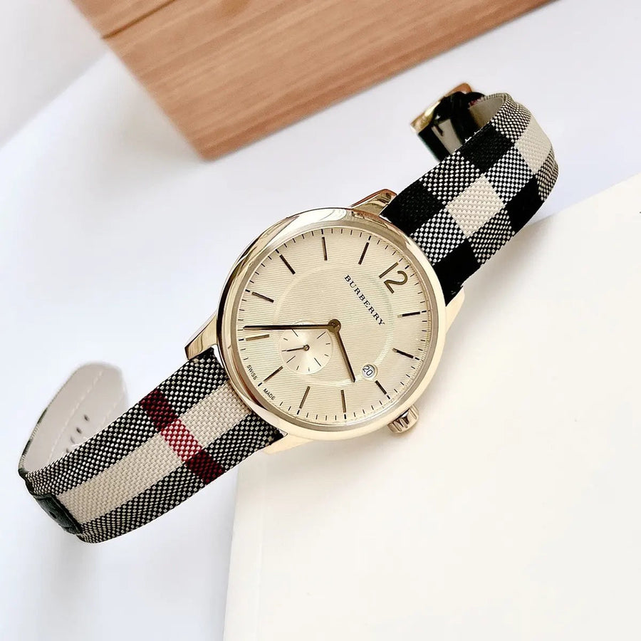 Front view of Burberry BU10001 men's watch with leather multicolour strap, gold dial, and gold case from The City collection