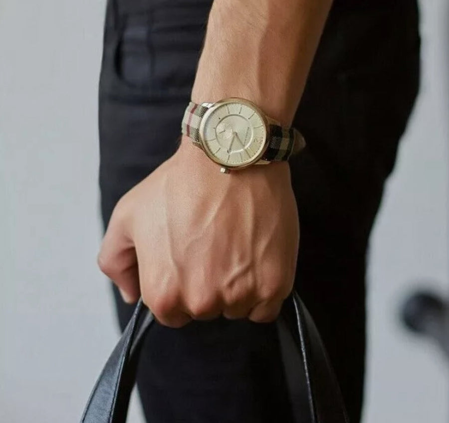 Front view of Burberry BU10001 men's watch with leather multicolour strap, gold dial, and gold case from The City collection