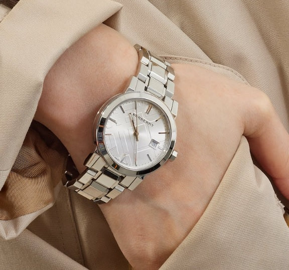 Elegant front view of Burberry BU9100 The City women’s watch with silver stainless steel strap and dial