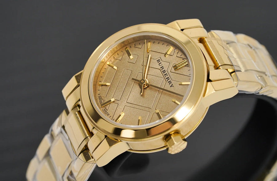 Front view of Burberry BU9227 The City women’s watch with stainless steel gold strap and gold dial