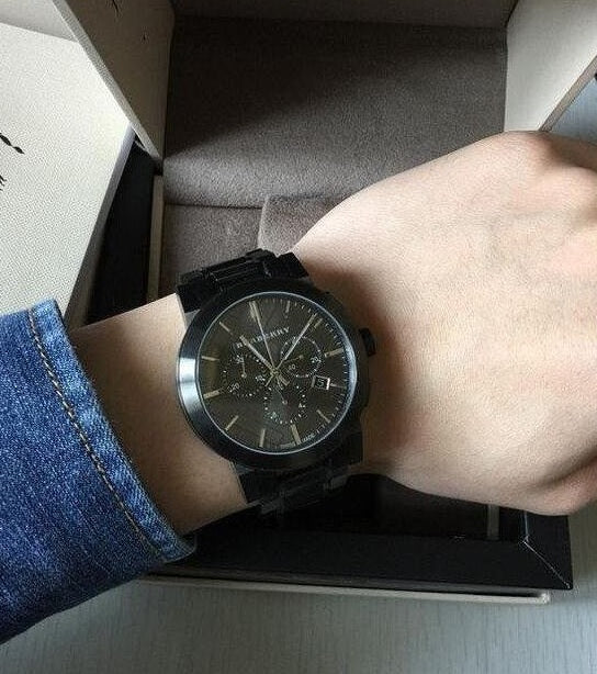 Front view of Burberry BU9354 The City men’s watch with dark grey stainless steel strap and dark grey dial