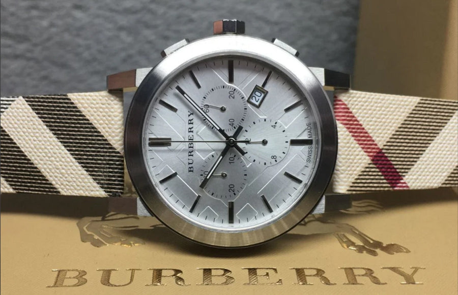 Front view of Burberry BU9357 The City men’s watch with multicolour leather strap and silver dial
