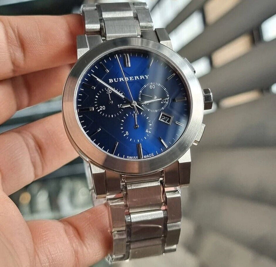 Front view of Burberry BU9363 men’s watch with stainless steel silver strap and blue dial