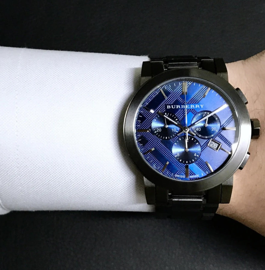 Front view of Burberry BU9365 men’s watch featuring blue dial and grey stainless steel strap