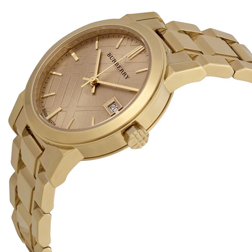 Front view of Burberry BU9134 women’s gold stainless steel watch with matching gold dial