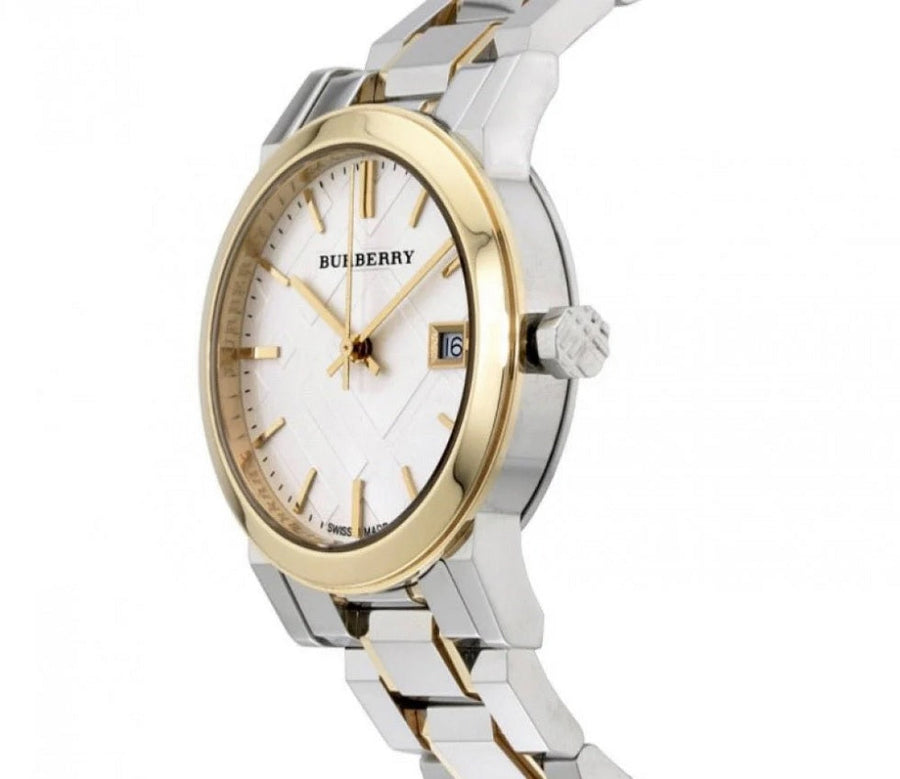 Close-up of Burberry BU9115 silver dial with gold-tone case and index markers