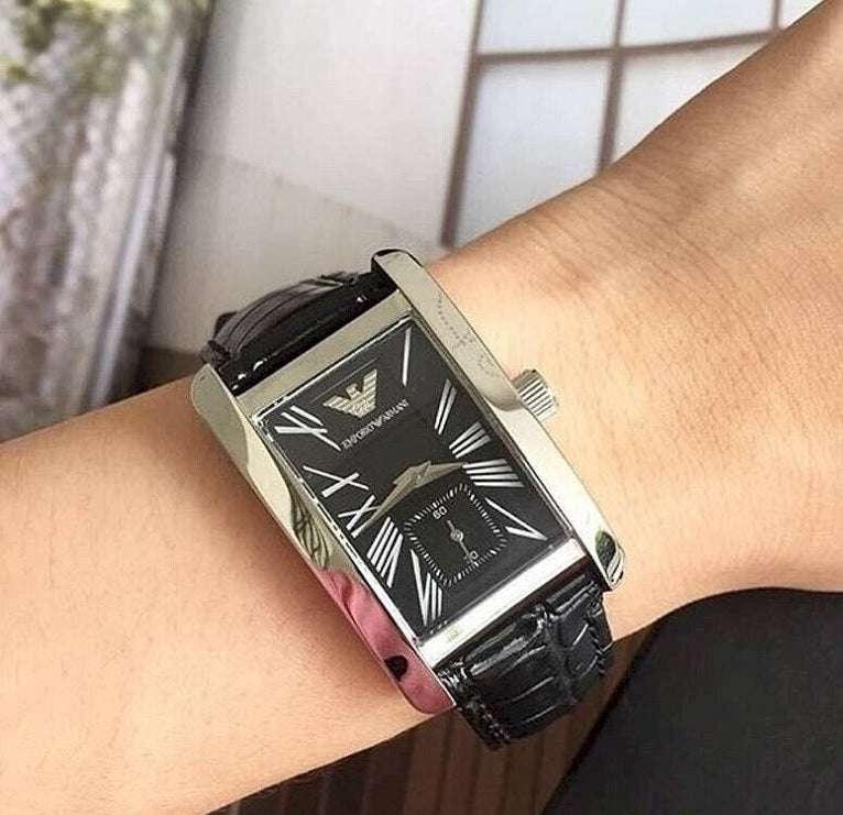 Close-up of Emporio Armani AR0143 leather strap and black dial details