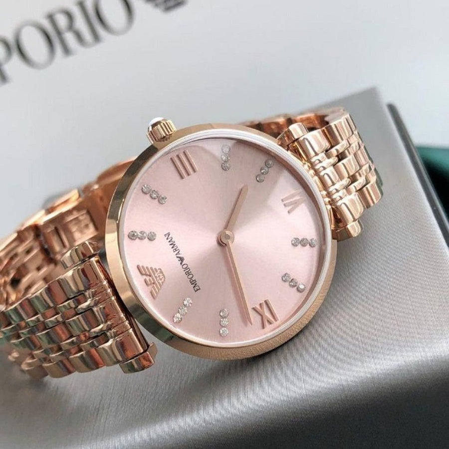 Front view of Emporio Armani AR11059 Gianni T-Bar women’s watch with gold dial and rose gold blush strap