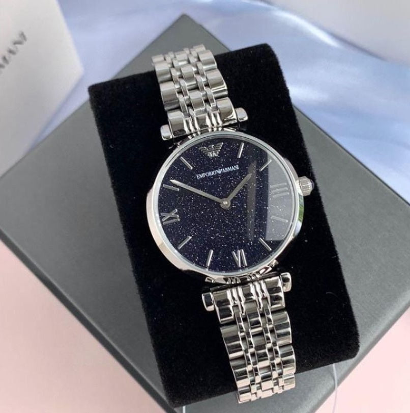 Front view of Emporio Armani AR11091 Gianni T-Bar women’s watch with blue dial and stainless steel strap