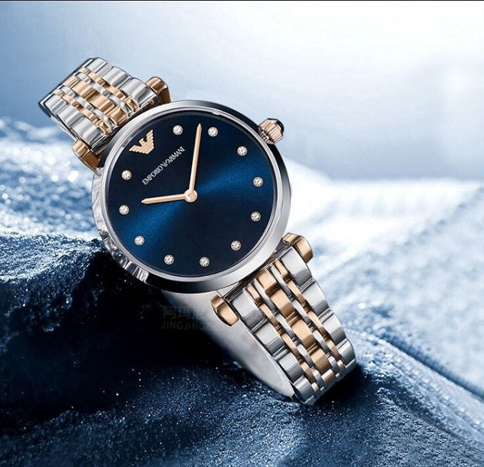 Front view of Emporio Armani AR11092 Gianni T-Bar women’s watch with blue dial and two-tone strap