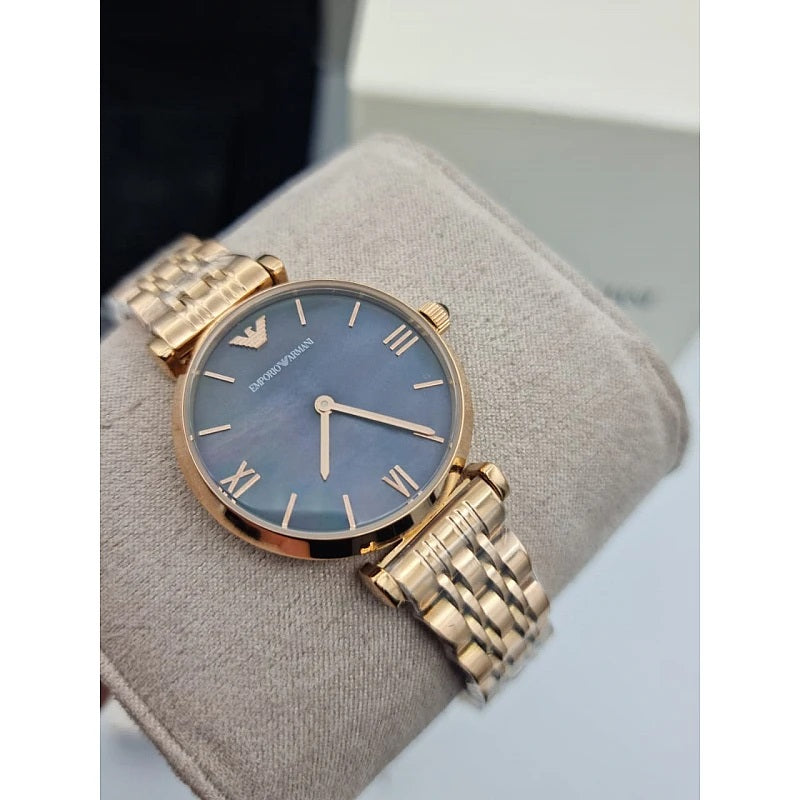 Front view of Emporio Armani AR11145 Gianni T-Bar women’s watch with black dial and rose gold strap