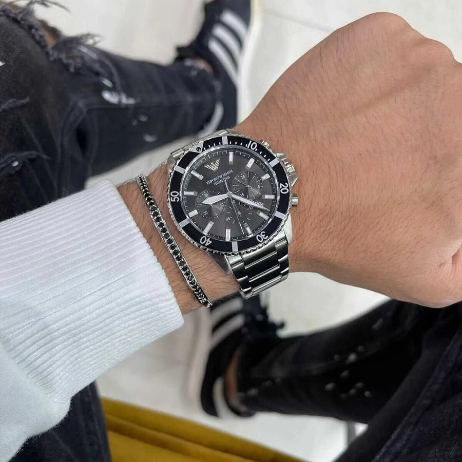 Front view of Emporio Armani AR11360 showcasing bold black dial and diver bezel