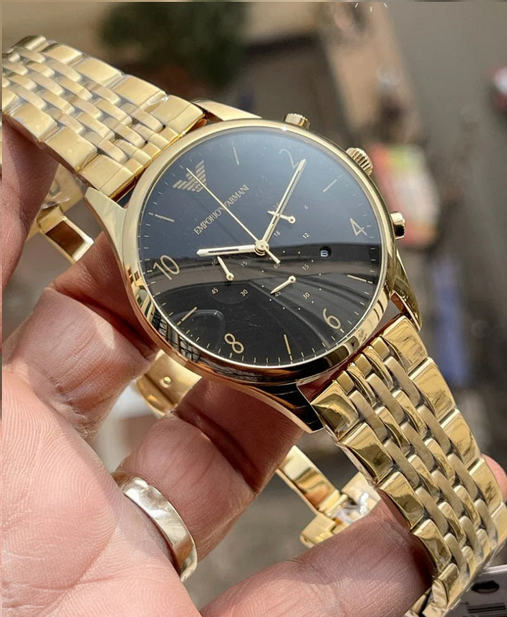 Front view of Emporio Armani AR1893 with gold stainless steel strap and bold black dial