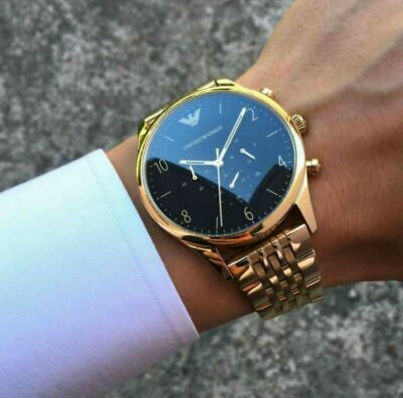Front view of Emporio Armani AR1893 with gold stainless steel strap and bold black dial