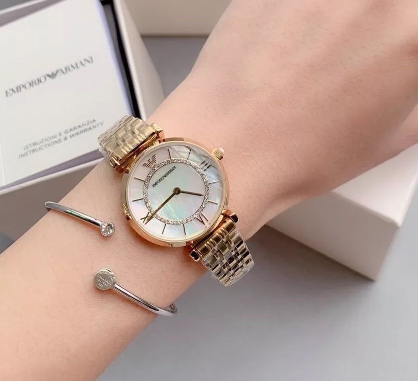 Front view of Emporio Armani AR1907 with gold stainless steel bracelet and mother of pearl dial