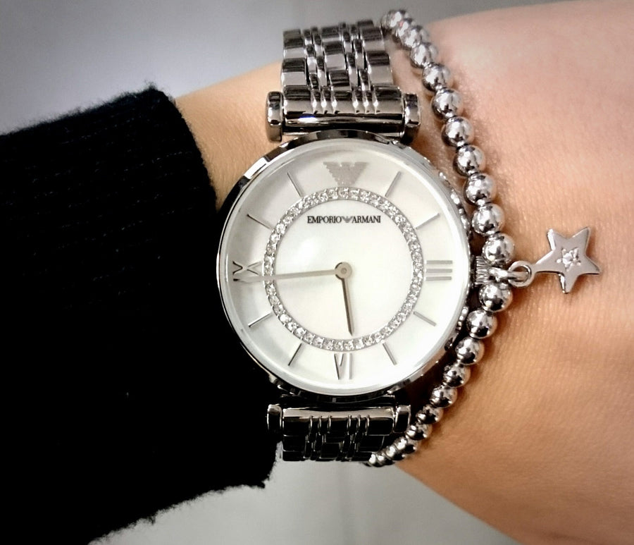 Front view of Emporio Armani AR1908 with silver stainless steel bracelet and pearl dial