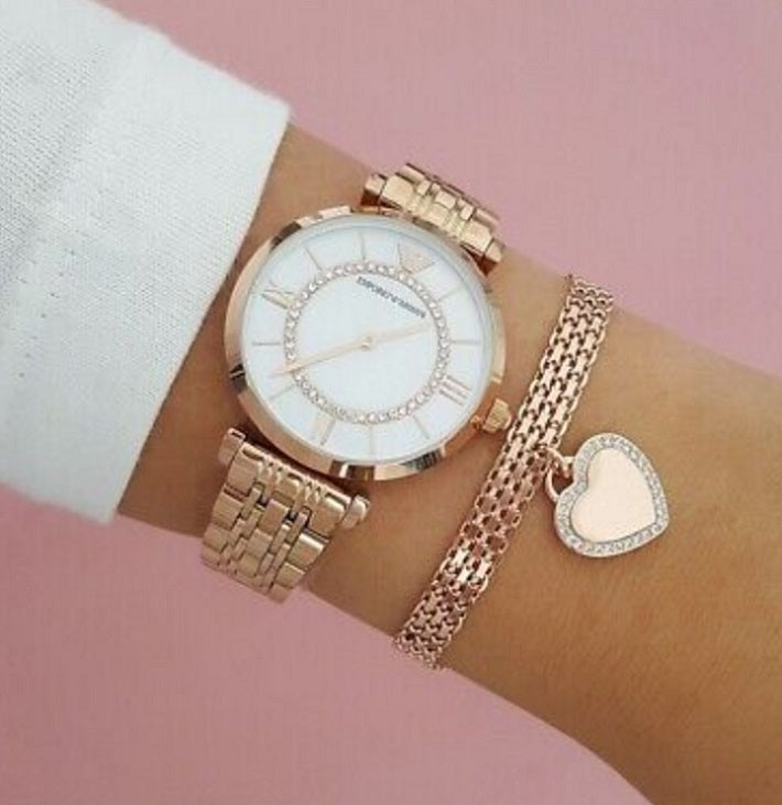 Front view of Emporio Armani AR1909 with a feminine rose gold finish and pearl dial