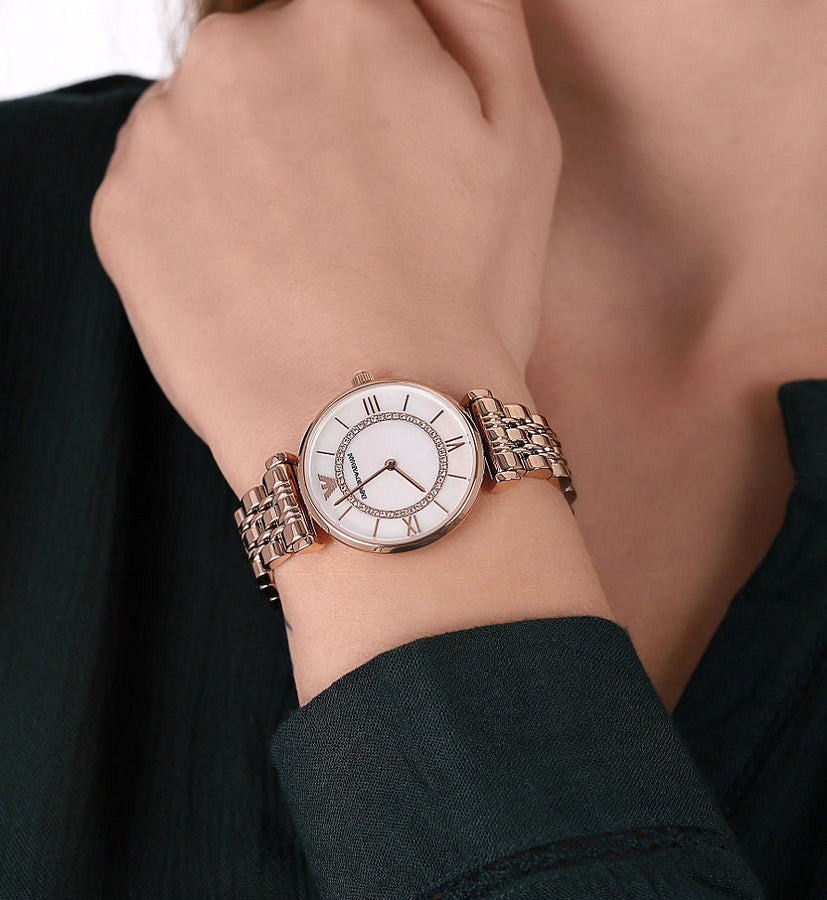 Front view of Emporio Armani AR1909 with a feminine rose gold finish and pearl dial