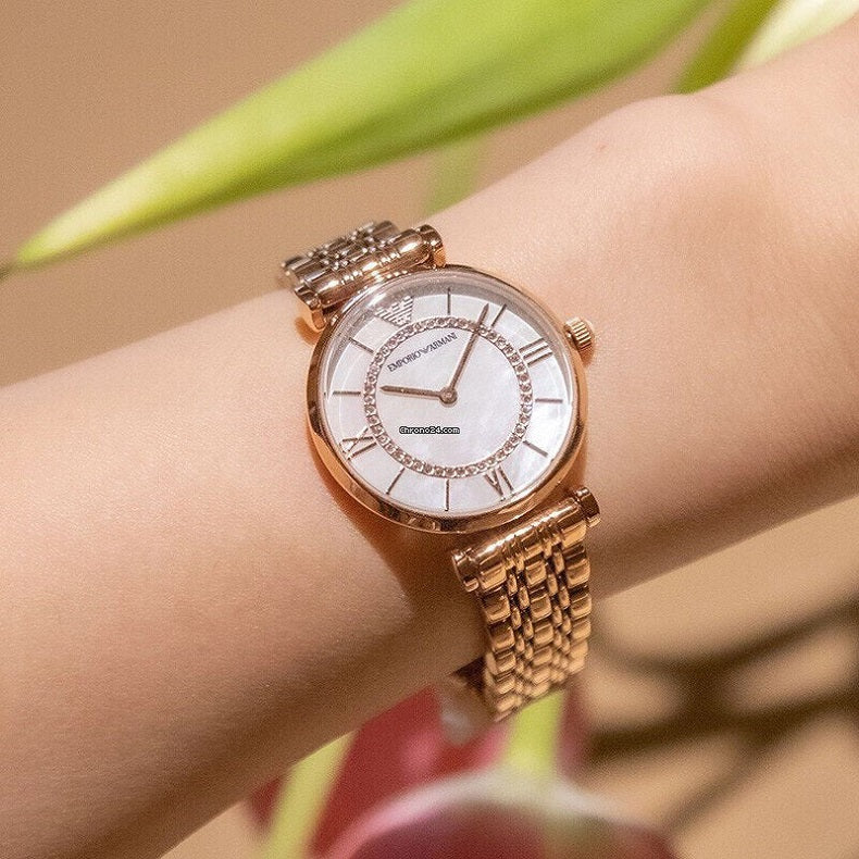 Front view of Emporio Armani AR1909 with a feminine rose gold finish and pearl dial