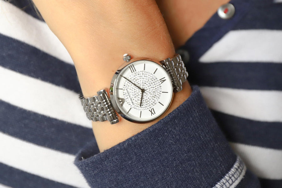 Front view of Emporio Armani AR1925 women’s watch with sparkling white dial and silver bracelet