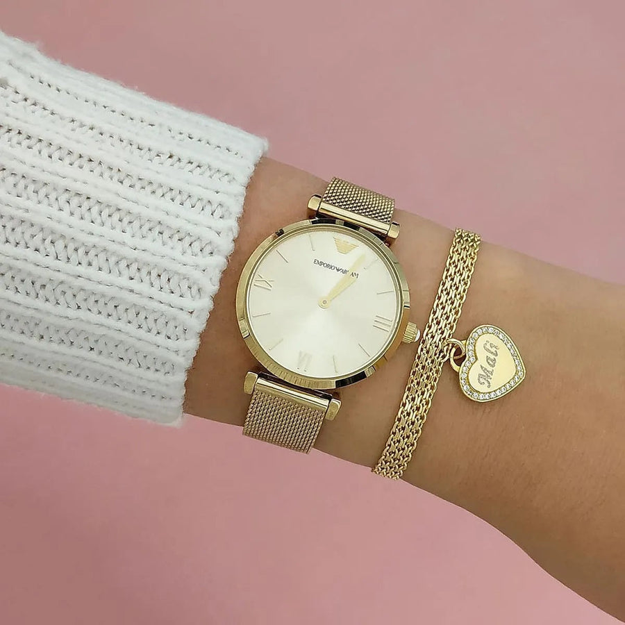 Front view of Emporio Armani AR1957 women’s gold mesh watch with minimal dial