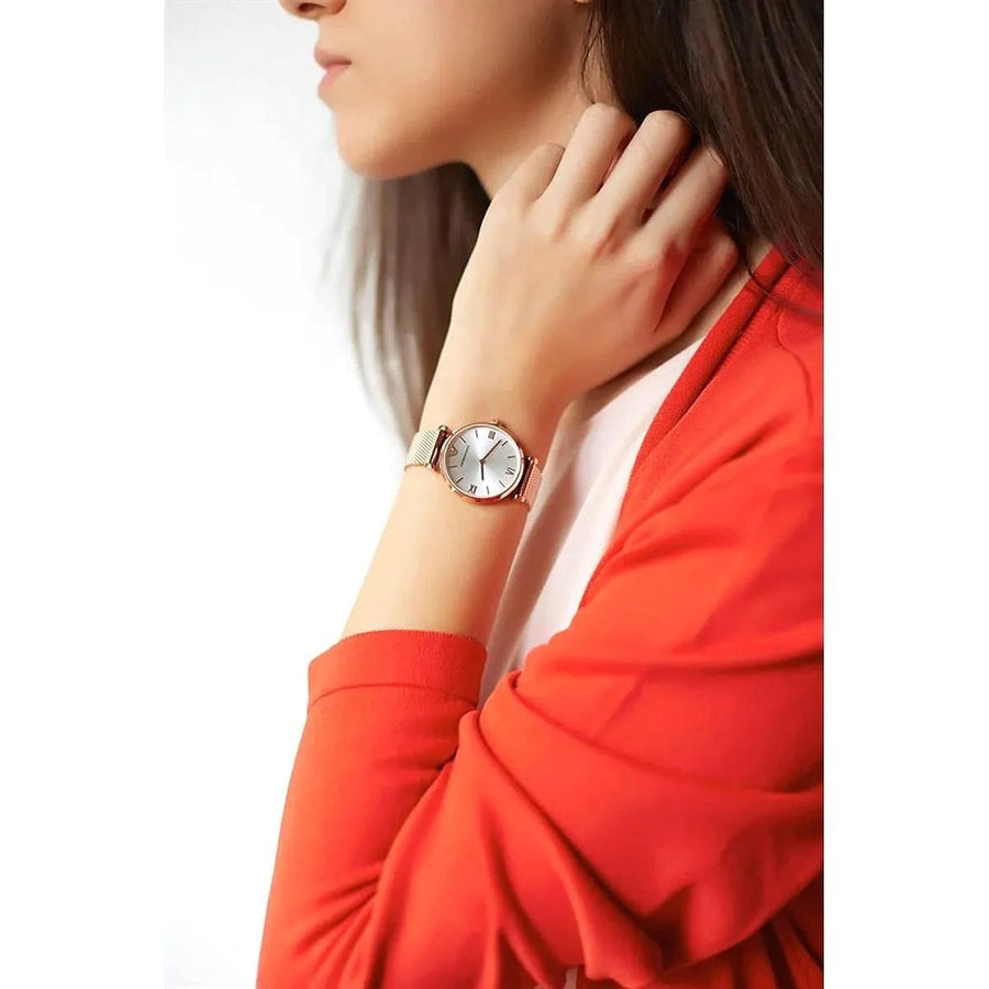 Front view of Emporio Armani AR1957 women’s gold mesh watch with minimal dial