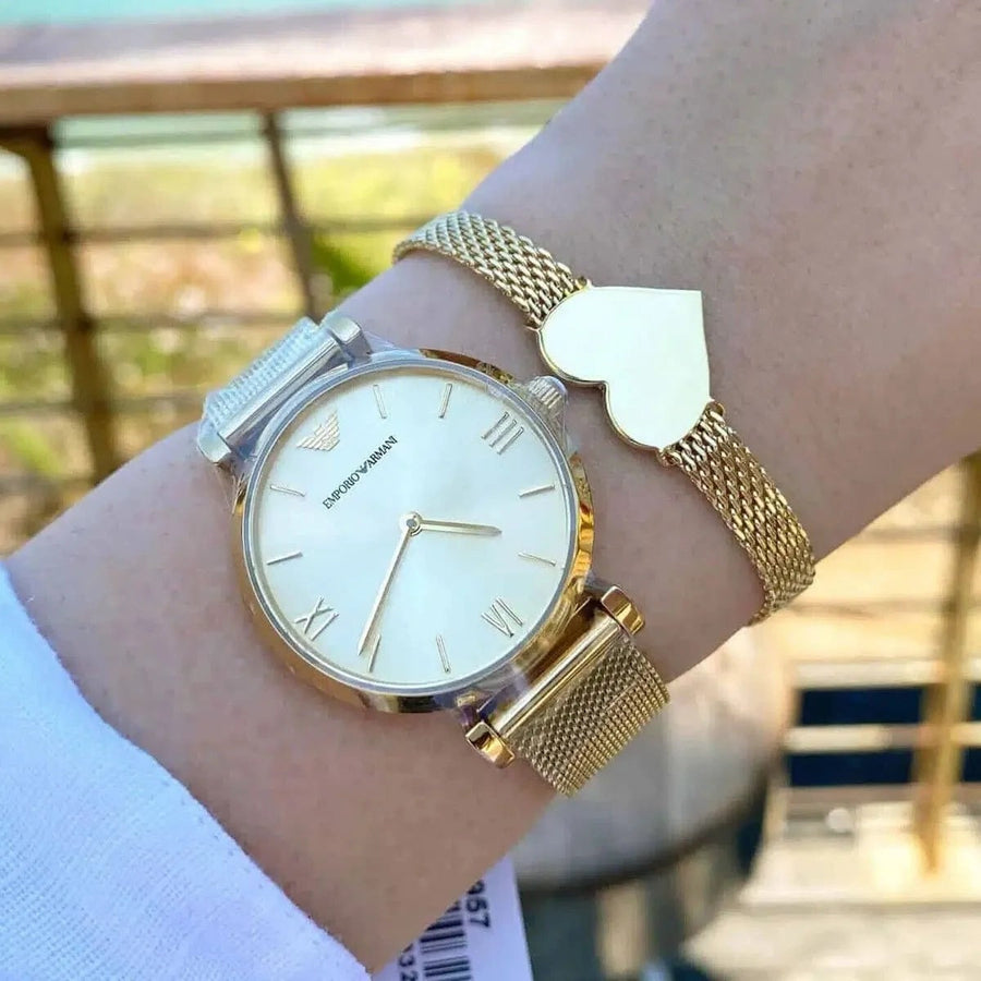 Front view of Emporio Armani AR1957 women’s gold mesh watch with minimal dial