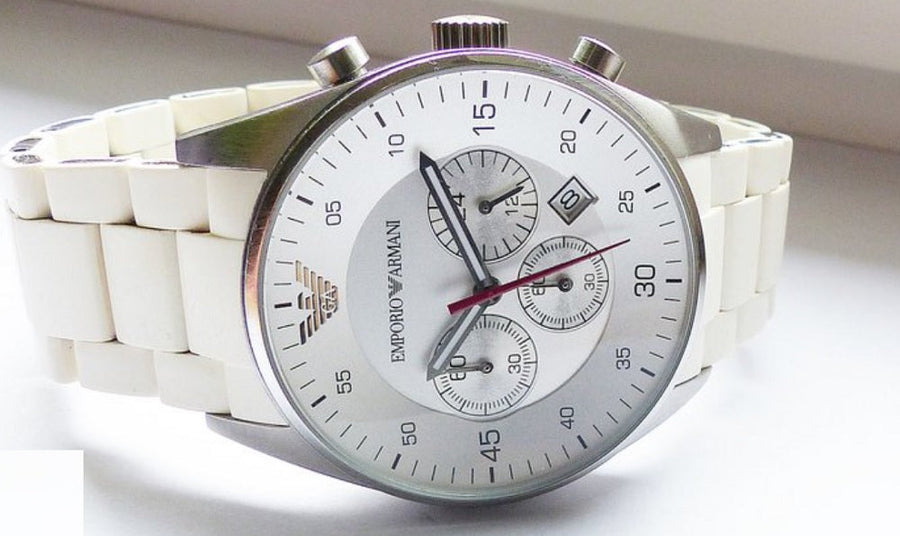 Front view of Emporio Armani AR5859 Sportivo men’s watch with silicone white strap, white dial, and silver case