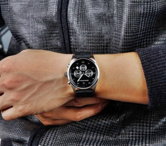 Front view of Emporio Armani AR5866 Sportivo men’s watch with black and grey silicone strap and silver case