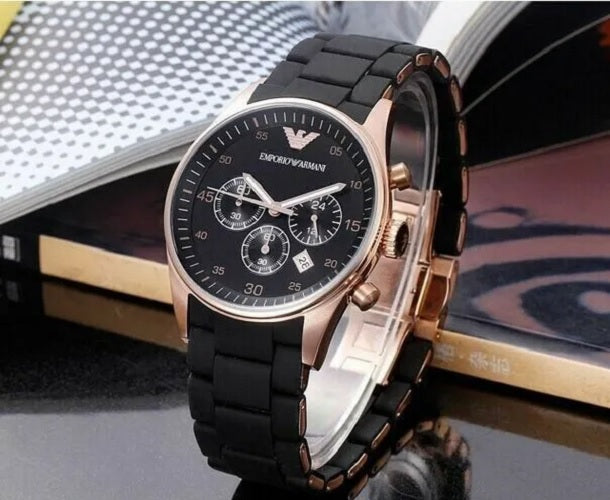 Front view of Emporio Armani AR5905 Sportivo men’s watch with black silicone strap and rose gold case