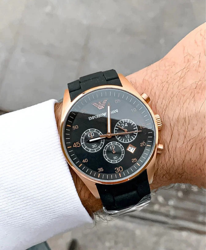 Front view of Emporio Armani AR5905 Sportivo men’s watch with black silicone strap and rose gold case