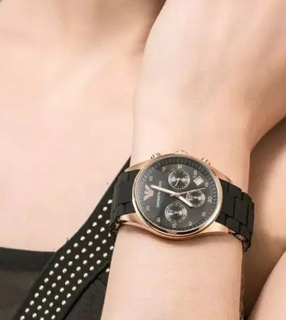 Front view of Emporio Armani AR5906 Sportivo women’s watch with black silicone strap and rose gold case