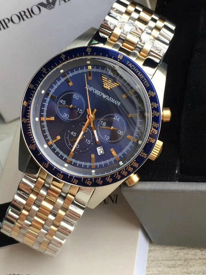 Front view of Emporio Armani AR6088 Tazio men’s watch with navy blue dial and two-tone silver and gold-tone strap