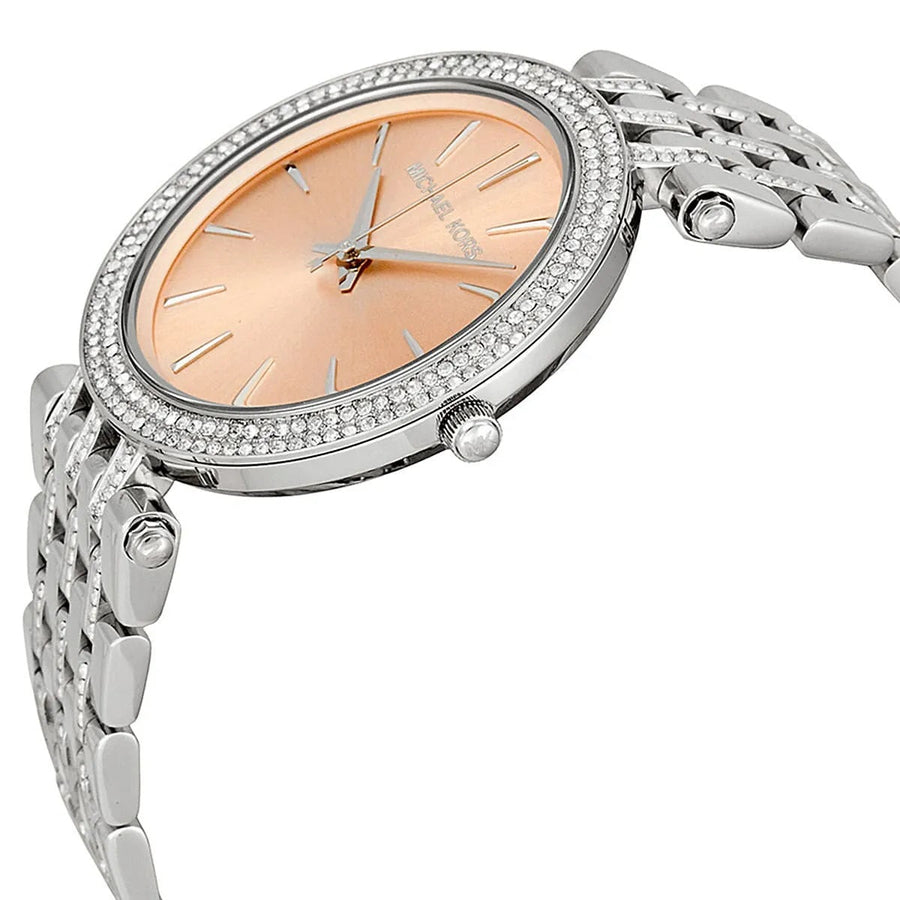 Front view of Michael Kors MK3218 women’s watch with stainless steel silver strap and beige dial, featuring crystals for added elegance