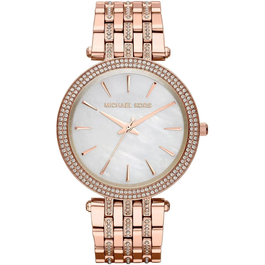 Close-up of Michael Kors MK3220 mother of pearl dial, featuring crystal accents and signature MK branding