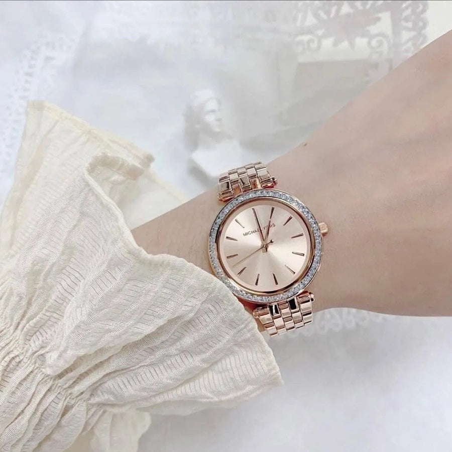 Front view of Michael Kors MK3366 with sparkling rose gold dial and crystal accents