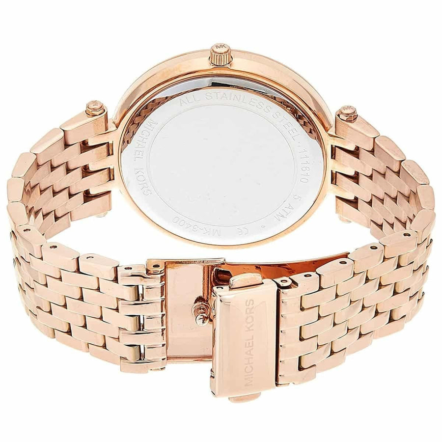 Front view of Michael Kors MK3399 showcasing rose gold crystal dial and matching strap