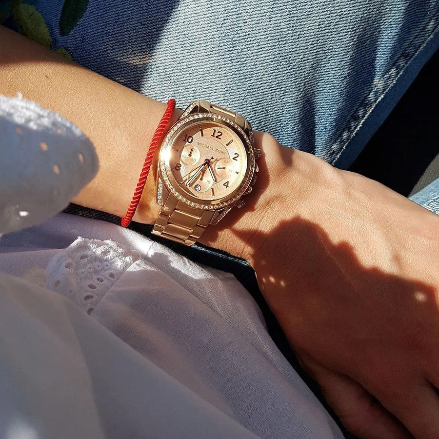 Front view of Michael Kors MK5263 showcasing rose gold dial and crystal-set bezel