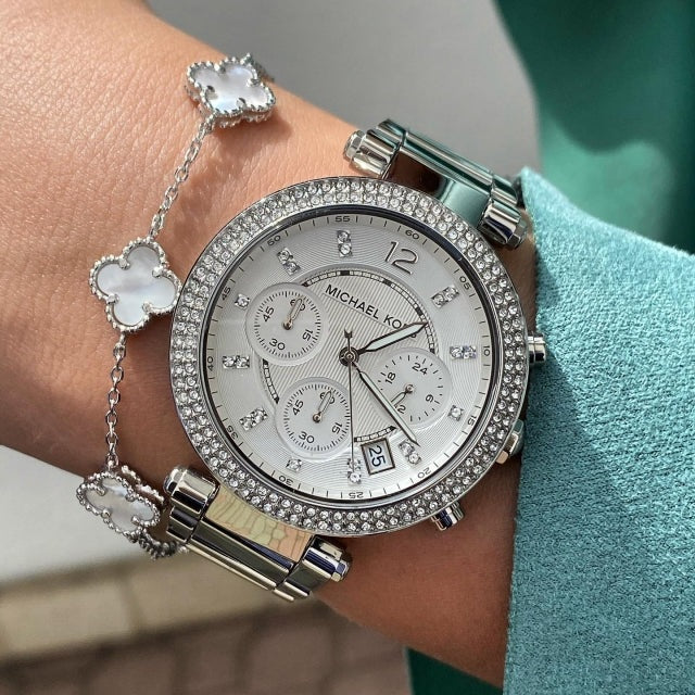 Front view of Michael Kors MK5353 showcasing silver dial and sparkling crystals around the bezel
