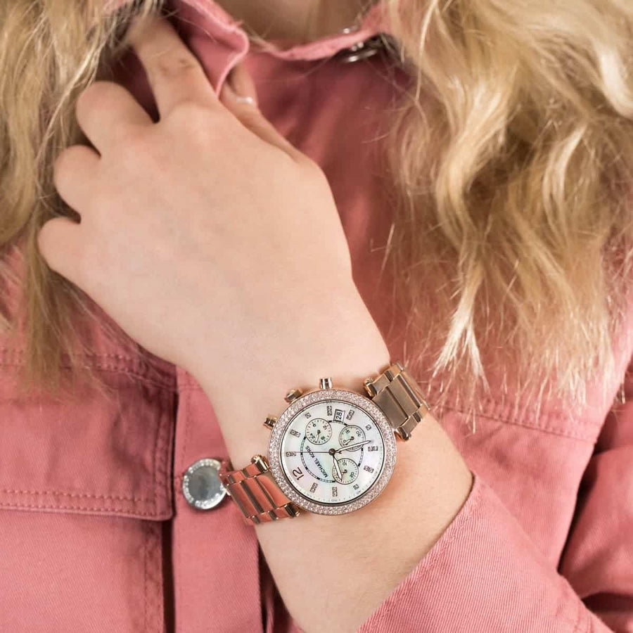 Front view of Michael Kors MK5491 showcasing rose gold case and shimmering mother of pearl dial