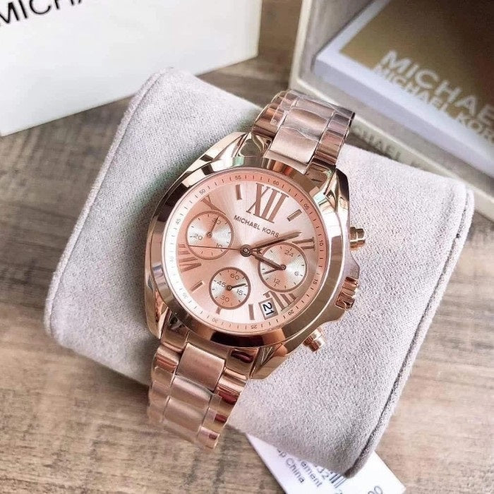 Front view of Michael Kors MK5799 women's watch with elegant rose gold dial