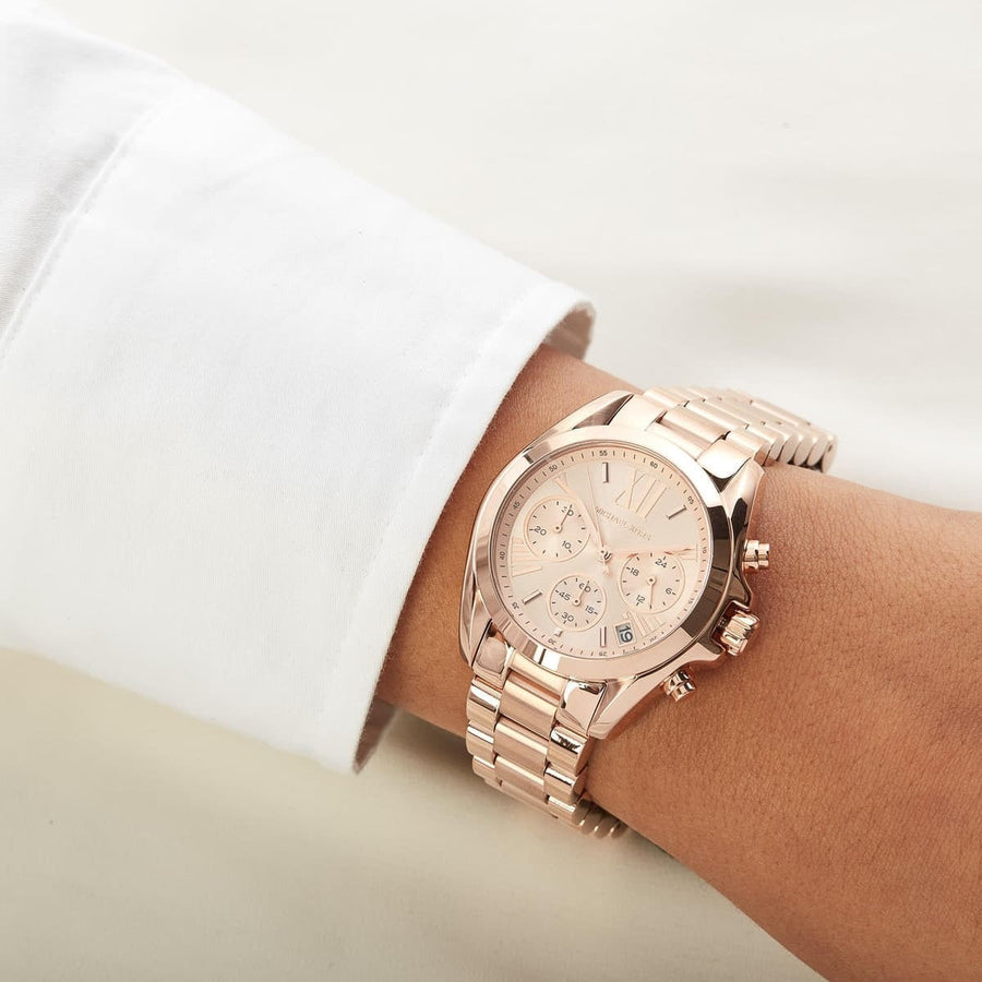 Front view of Michael Kors MK5799 women's watch with elegant rose gold dial